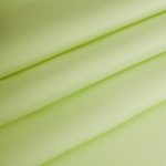 Tkanina gładka tk.114 jasno zielona obrusowa zasłonowa