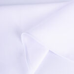 Okrągły biały obrus z białą lamówką